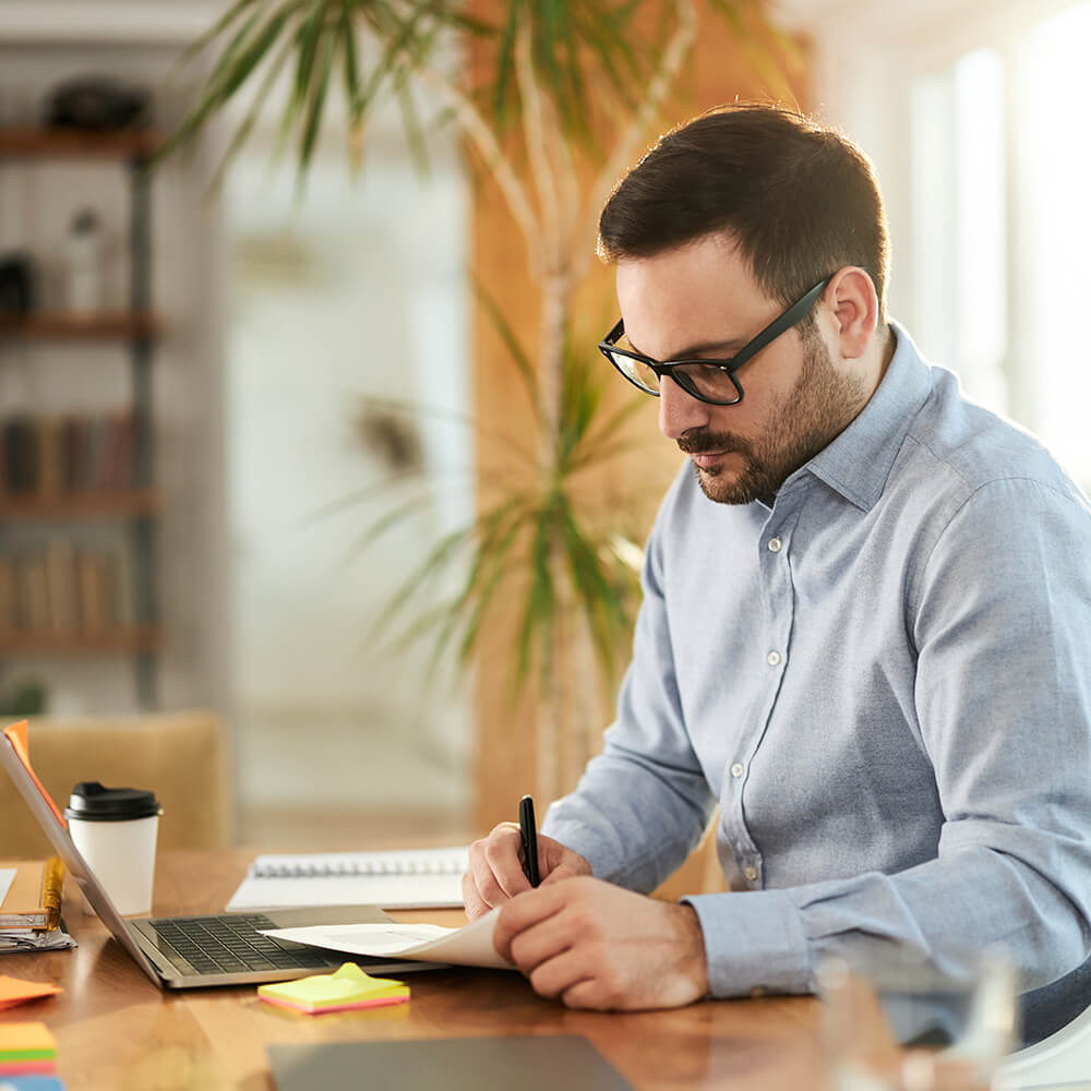 Man in front of computer