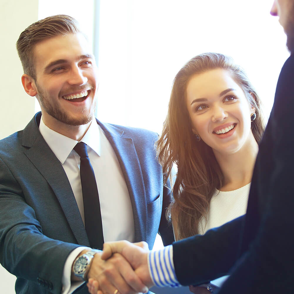 Man and Woman meeting another person