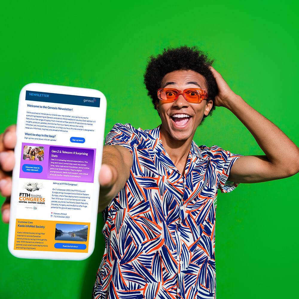 Man holding mobile showing Genexis Newsletter