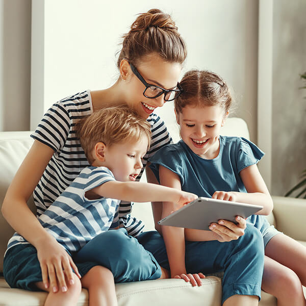 Mom with kids and tablet