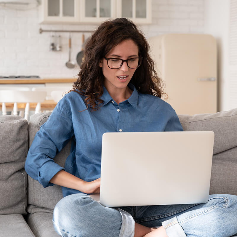 worried woman with computer