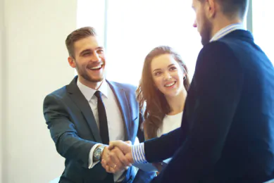 people shaking hands