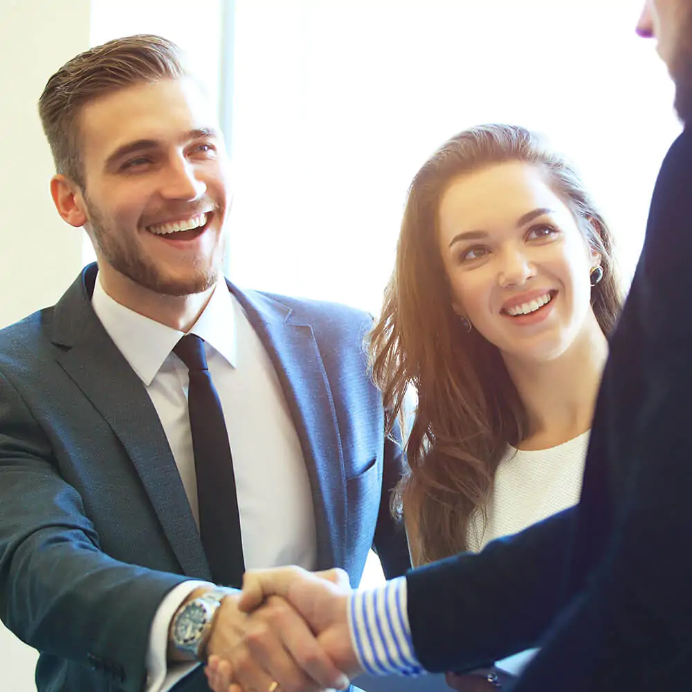 Man and Woman meeting another person